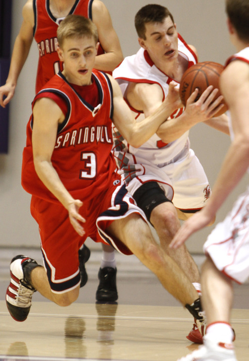 Rick Egan   |  The Salt Lake Tribune

Bountiful's Brit Harding steals the ball from Parker Brady, Springville, in 4A Championship basketball action,  Bountiful vs. Springville, at the Dee Event Center in Ogden, Thursday, March 3, 2011