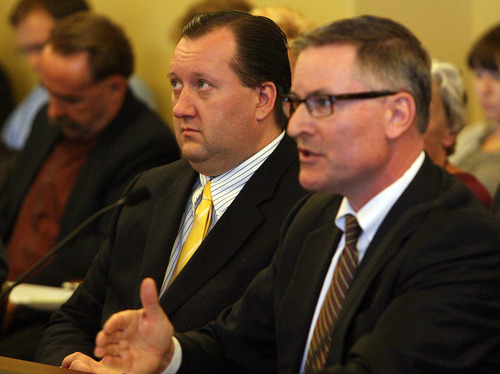 Leah Hogsten  |  The Salt Lake Tribune
Rep. John Dougall, left, listens as Jeff Hunt, an attorney with Utah Media Coalition, gives his dissenting remarkson Dougall's HB477, which would substantially rewrite Utah's open-records law.