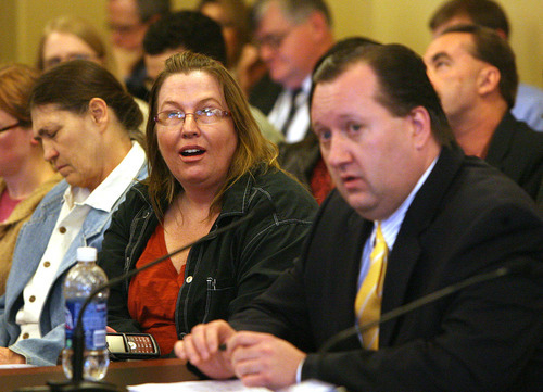 Leah Hogsten  |  The Salt Lake Tribune
An unidentified woman reacts to Rep. John Dougall as he makes his final remarks on HB477, which would substantially rewrite Utah's open-records law.