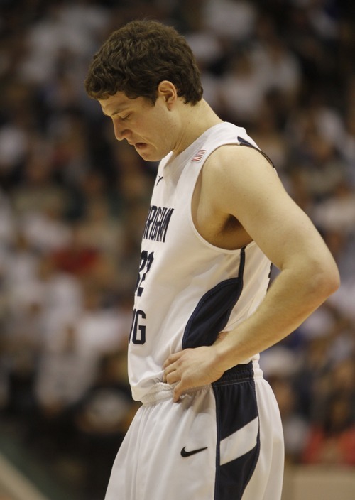 Rick Egan  |  The Salt Lake Tribune

BYU guard Jimmer Fredette (32) hangs his head late in the second half, as the Cougars fall further and further behind,  in Mountain West Basketball action, BYU vs New Mexico in the Marriott Center in Provo, Wednesday, March 2, 2011
