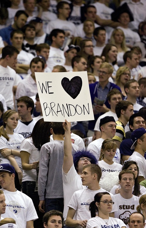 Djamila Grossman  |  The Salt Lake Tribune

Brigham Young University plays New Mexico in Provo, Utah, on Wednesday, March 2, 2011. BYU fans hold up a sign in reaction to player Brandon Davies who was kicked off the team for a BYU honor code violation.