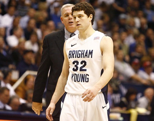 Djamila Grossman  |  The Salt Lake Tribune

Brigham Young University plays New Mexico in Provo, Utah, on Wednesday, March 2, 2011. BYU's coach Dave Rose talks to Jimmer Fredette (32) during a timeout in the second half. BYU lost the game.