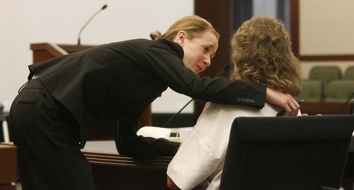 Paul Fraughton  |  The Salt Lake Tribune
Jackie Hopkinson, co-counsel for Debra Brown, talks to Brown after she testified Friday in 2nd District Court.