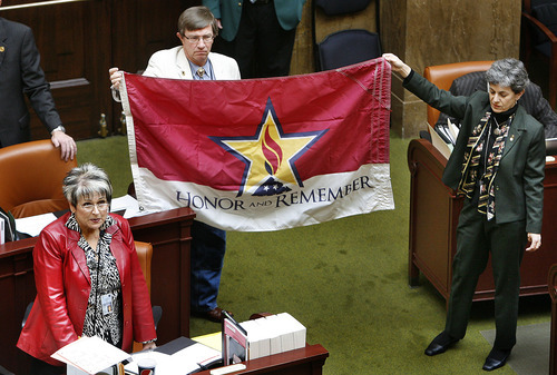Scott Sommerdorf  |  The Salt Lake Tribune
HB250 by Rep. Merlynn Newbold, R-South Jordan, designates an official flag to honor military members killed in the line of duty.
