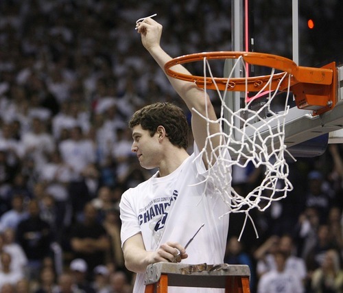 Trent Nelson  |  The Salt Lake Tribune
BYU's Jimmer Fredette cuts a piece of the net in celebration after BYU defeated Wyoming, college basketball in Provo, Utah, Saturday, March 5, 2011.