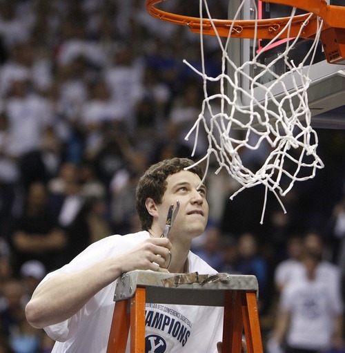 Trent Nelson  |  The Salt Lake Tribune
BYU's Jimmer Fredette cuts a piece of the net in celebration after BYU defeated Wyoming, college basketball in Provo, Utah, Saturday, March 5, 2011.