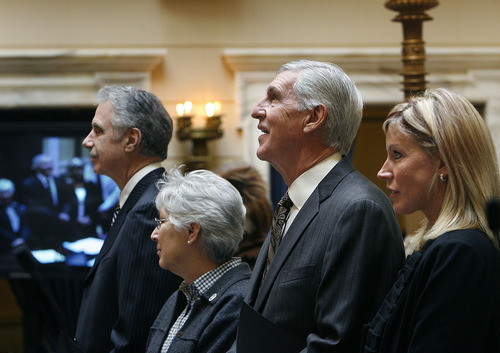 Scott Sommerdorf  |  The Salt Lake Tribune
Former Utah Jazz coach Jerry Sloan (second from right) looks around the Senate chambers as he and assistant coach Phil Johnson were being honored Monday, March 7, 2011. At the far right is Tammy Sloan, wife of Jerry Sloan, and second from left is Gail Miller.