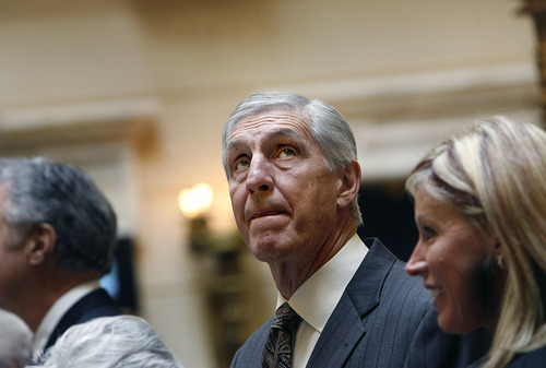 Scott Sommerdorf  |  The Salt Lake Tribune
Former Utah Jazz coach Jerry Sloan looks around the Senate chambers as he and assistant coach Phil Johnson were honored there, Monday, March 7, 2011. Tammy Sloan, wife of Jerry Sloan, is on the coach's right.