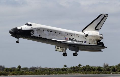 Space shuttle Discovery lands at the Kennedy Space Center in Cape Canaveral, Fla., Wednesday, March 9, 2011. (AP Photo/John Raoux)