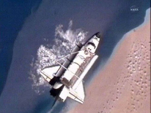 In a photo made from NASA television the Space Shuttle Discovery is 216 miles above the Sahara Desert after separating from the International Space Station Monday March 7, 2011.  The Discovery is scheduled to land Wednesday as it completes its final mission. (AP PHoto/NASA)