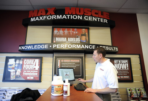 Sarah A. Miller  |  The Salt Lake Tribune
Max Muscle owner James Gustason pulls up a personal nutrition program on his computer at his new Bountiful store during its opening day on Tuesday. Max Muscle is a national chain that provides nutritional education and products. 
