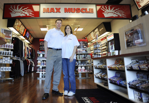 Sarah A. Miller  |  The Salt Lake Tribune
Max Muscle owners James and Becky Gustason stand in their new Bountiful store during its first day of business Tuesday. Max Muscle is a national chain that provides nutritional education and products. 