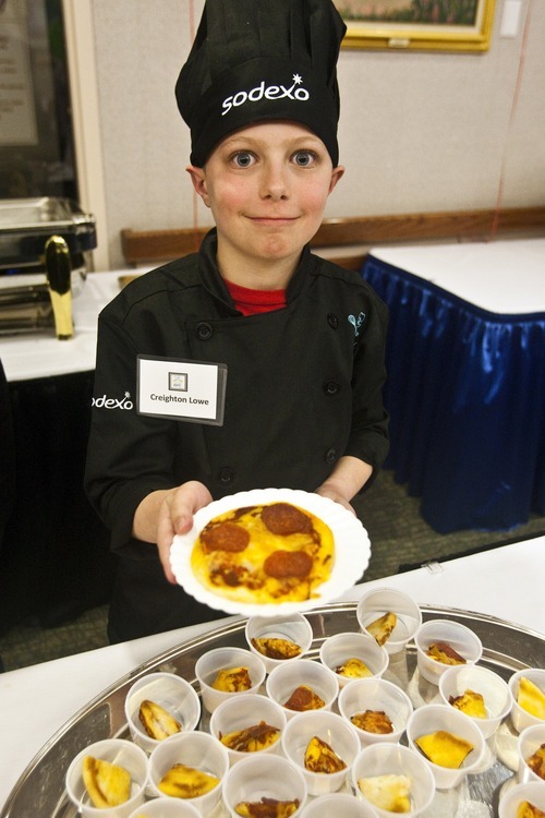 Chris Detrick | The Salt Lake Tribune
Creighton Lowe, a fourth-grader at Whittier Elementary, shows off a personal pizza during the first Future Chefs of America competition at the Granite Education Center.