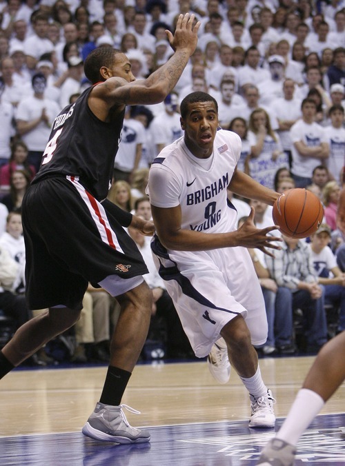 Steve Griffin  |  The Salt Lake Tribune
 
BYU forward Brandon Davies drives into the lane during first half action of the BYU versus San Diego State men's basketball game at the Marriott Center in Provo Wednesday, January 26, 2011.
