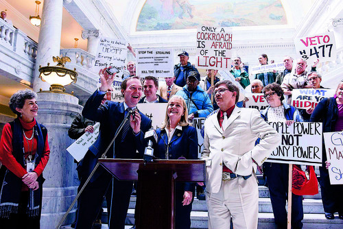 TRENT NELSON  |  The Salt Lake Tribune
Sen. Ben McAdams holds up his state-supplied BlackBerry, offering to let people look through it during a protest against HB477.