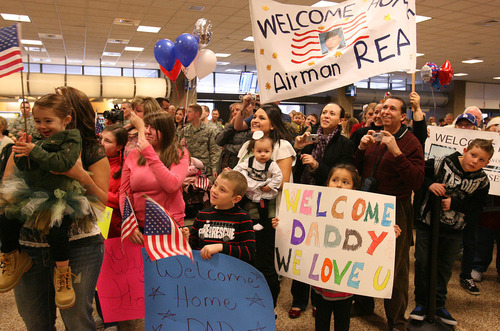 Leah Hogsten  |  The Salt Lake Tribune
About 30 Air Force reservists from Hill Air Force Base's 419th Fighter Wing returned from a six-month deployment to Bagram Airfield, Afghanistan, on Wednesday. While deployed, the civil engineering personnel traveled throughout northeastern Afghanistan, completing construction projects at 62 forward operating bases and combat outposts.