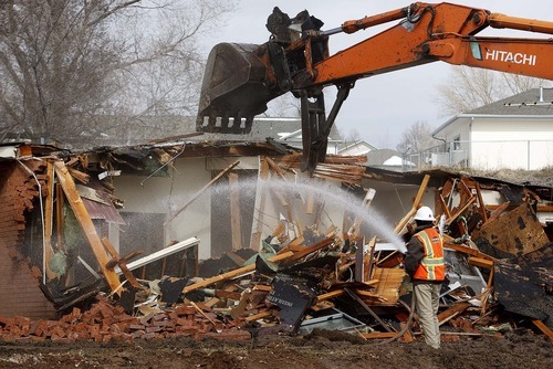 Trent Nelson  |  The Salt Lake Tribune
The last of 466 military family homes at Hill Air Force Base was demolished Wednesday.