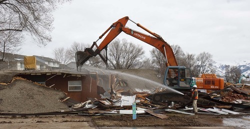 Trent Nelson  |  The Salt Lake Tribune
The last of 466 military family homes at Hill Air Force Base was demolished Wednesday.