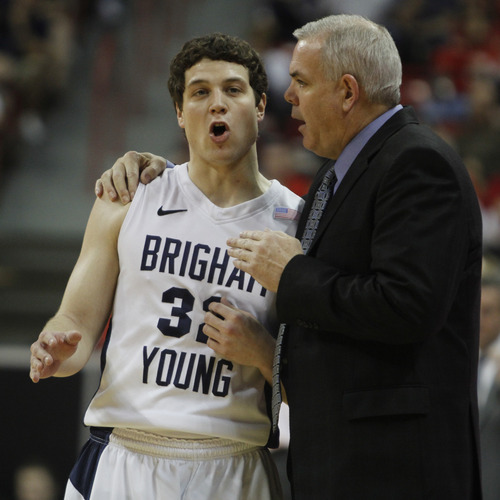 Rick Egan  | Salt Lake Tribune

BYU head coach Dave Rose talks to BYU guard Jimmer Fredette (32), during a break in the action, BYU vs. TCU, in the Mountain West Conference Championships in Las Vegas, March 10, 2011