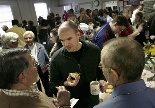 Scott Sommerdorf  |  The Salt Lake Tribune
Tim DeChristopher shares coffee and cookies after the service with fellow members of the Salt Lake Unitarian congregation. The Unitarian Universalist Church in Salt Lake City showed it's support for Tim DeChristopher during it's service, Sunday, March 6, 2011.