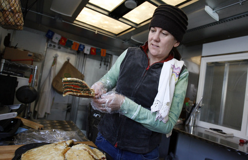 Francisco Kjolseth  |  The Salt Lake Tribune
Julie Sheehan, owner of the Torta Truck, gets ready for a lunch rush in the Cottonwood Heights area. Sheehan will be featured in the annual 