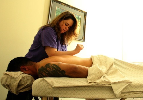 Leah Hogsten The Salt Lake Tribune Elise Conn, a licensed massage therapist...