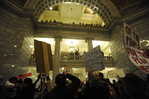 SARAH A. MILLER  |  The Salt Lake Tribune
Protesters congregate inside the Utah State Capitol Rotunda Thursday night after rallying outside to condemn passsage of HB477, adding new restrictions on public access to government records.