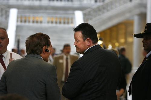 SCOTT SOMMERDORF  |  The Salt Lake Tribune
Rep. Carl Wimmer, R-Herriman, speaks with tea party supporters, as they wait for an opposing group to finish their rally in the rotunda, so the tea party can begin its rally against immigration legislation.