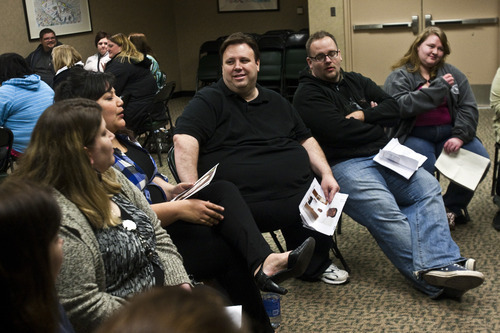 Photo by Chris Detrick | The Salt Lake Tribune 
Dave Darrough, of Provo, center, and Justin Griffin, of Provo, listen during a casting call for 