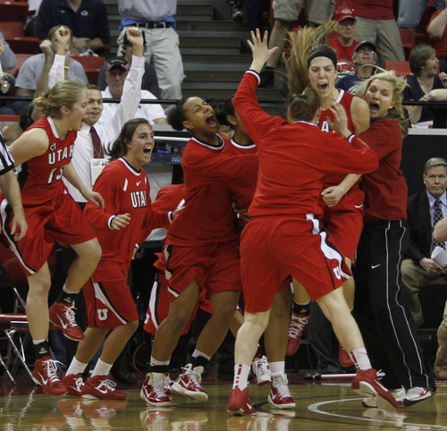 Rick Egan  | Salt Lake Tribune

The Lady Utes celebrate their one-point win over BYU after Utah forward Michelle Plouffe (15) hit a shot at the buzzer to give the Utes a 50-49 win over the first-seed BYU Cougars, in the Mountain West Conference Championships in Las Vegas, Friday, March 11, 2011.