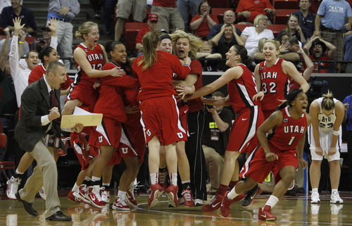 Rick Egan  | Salt Lake Tribune

The Lady Utes celebrate their one-point win over BYU after Utah forward Michelle Plouffe (15) hit a shot at the buzzer to give the Utes a 50-49 win over the first-seed BYU Cougars, in the Mountain West Conference Championships in Las Vegas, Friday, March 11, 2011.