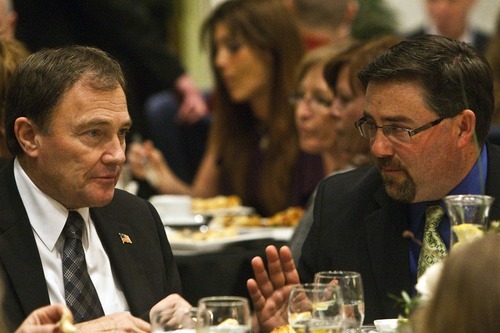 Photo by Chris Detrick | The Salt Lake Tribune 
Governor Gary R. Herbert and Greg Johnson, President of Standing Together, talk during Standing Together's10th anniversary celebration at the Salt Lake Christian Center Friday March 11, 2011. Standing Together is a consortium of Evangelical Christians in Utah.