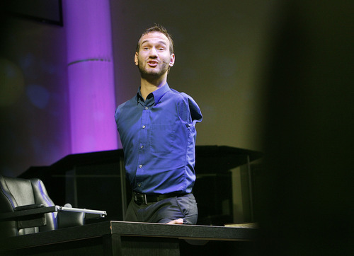 Scott Sommerdorf  |  The Salt Lake Tribune
Nick Vujicic speaks from atop a desk before a full house at Mountain View Christian Assembly in Sandy, Sunday, March 13, 2011. Vujicic was born without arms or legs, as a result of a rare disorder called Tetra-amelia. He is now a motivational preacher who speaks on life without limbs, life without limits.