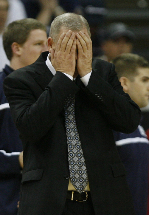 Rick Egan   |  The Salt Lake Tribune

BYU coach Dave Rose reacts as things continute to go the way of the Aztecs,
in the Mountain West Championship game, BYU vs. San Diego State, in Las Vegas, Saturday, March 12, 2011