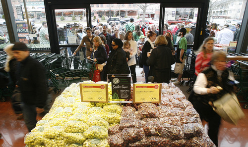 Francisco Kjolseth  |  The Salt Lake Tribune
Shoppers enter the new Whole Foods store at Trolley Square Monday, March 14, 2011.