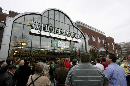 Francisco Kjolseth  |  The Salt Lake Tribune
A crowd of people gathers outside the new Whole Foods store at Trolley Square Monday, March 14, 2011.