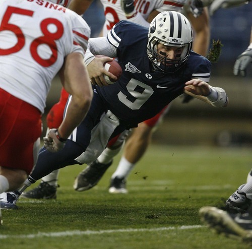 Trent Nelson  |  The Salt Lake Tribune
BYU quarterback Jake Heaps (9) runs for a touchdown during the first half,  BYU vs. New Mexico, Saturday, November 20, 2010.