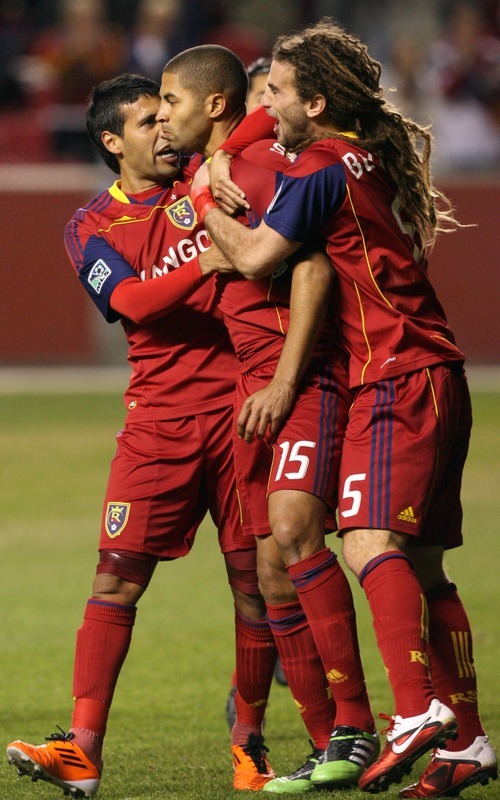 Leah Hogsten  |  The Salt Lake Tribune
Real Salt Lake's Alvaro Saborio celebrates his goal with Javier Morales (left) and Kyle Beckerman (right) in the ninth minute of the game. Real Salt Lake  played the first  its two-game series against Saprissa of Costa Rica in the CONCACAF Champions League at Rio Tinto Stadium  Tuesday March 15, 2011.