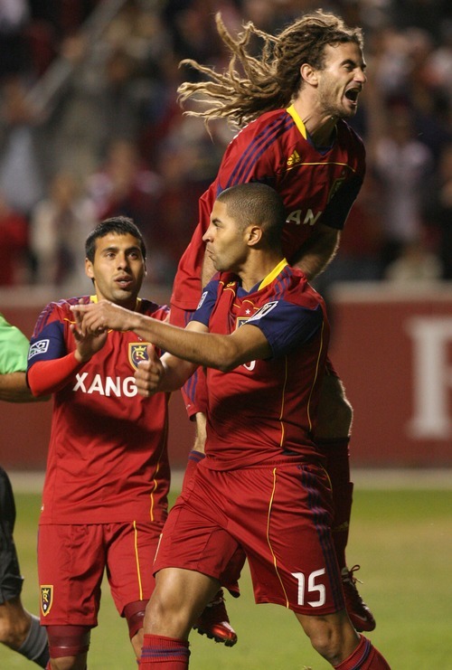 Leah Hogsten  |  The Salt Lake Tribune
Real Salt Lake's Alvaro Saborio celebrates his goal with Javier Morales (left) and Kyle Beckerman (right) in the ninth minute of the game. Real Salt Lake  played the first  its two-game series against Saprissa of Costa Rica in the CONCACAF Champions League at Rio Tinto Stadium  Tuesday March 15, 2011.