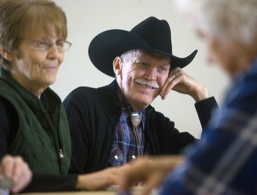 Al Hartmann   |  The Salt Lake Tribune 
Friends Donna Payne and Wayne Harris enjoy a few hands of Texas Hold'em after lunch at the North Davis Senior Activity Center in Clearfield. County officials used leftover money from the new Health Department building to build the senior center for $3.2 million -- about 10 years earlier than anyone had hoped, said center manager Marian McPeak.