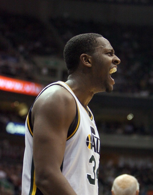Steve Griffin  |  The Salt Lake Tribune
 
 Utah Jazz guard C.J. Miles screams with excitement after being fouled as he scored a basket during a game against the Timberwolves at EnergySolutions Arena  in Salt Lake City on Wednesday, March 16, 2011.