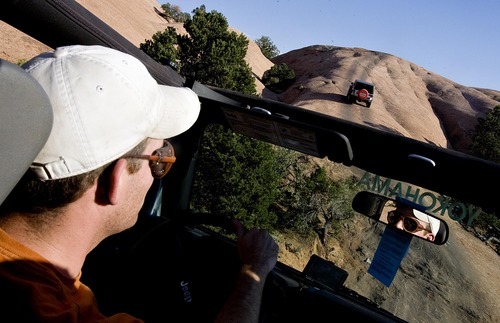 Djamila Grossman  |  The Salt Lake Tribune
Rob Covert drives a Jeep on the Fins & Things 4x4 trail near Moab on Saturday, Oct. 2, 2010.