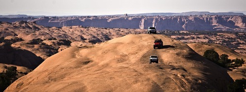 Djamila Grossman  |  The Salt Lake Tribune
Jeeps are seen in the distance on the Fins & Things 4x4 trail near Moab on Saturday, Oct. 2, 2010.
