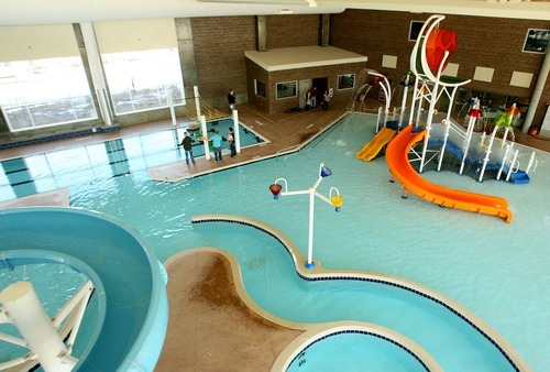 Leah Hogsten  |  The Salt Lake Tribune
The leisure pool with water slides, play structures, a lazy river and a water walk at the J.L. Sorenson Recreation Center.