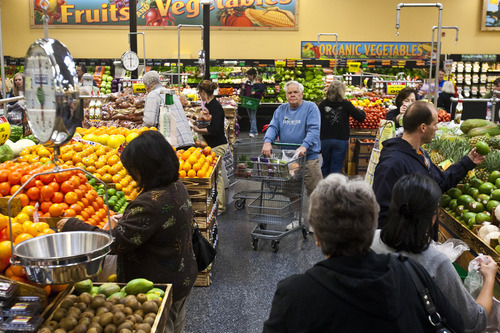 Chris Detrick | The Salt Lake Tribune 
Customers shop at Sunflower Farmers Market at 656 E. 200 South in Salt Lake City on Wednesday March 16, 2011.