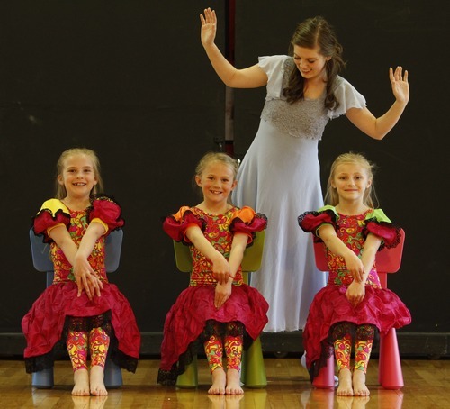 Rick Egan   |  The Salt Lake Tribune

Katie Lobrot (left) Samantha Manwaring (center) Maggie Simmons (right) and Jessica Turner (top) plays Alice in the Children's Dance Theatres  