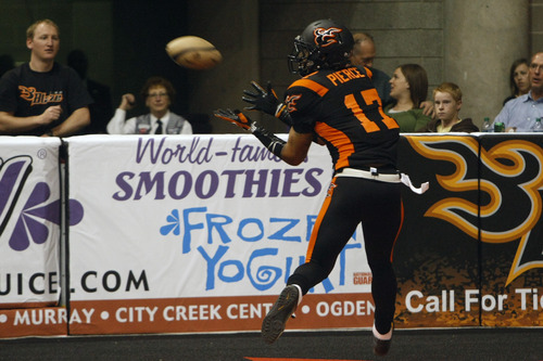 Photo by Chris Detrick | The Salt Lake Tribune 
Utah Blaze's Ernie Pierce (17) makes a touchdown catch during the game at EnergySolutions Arena Thursday March 17, 2011.