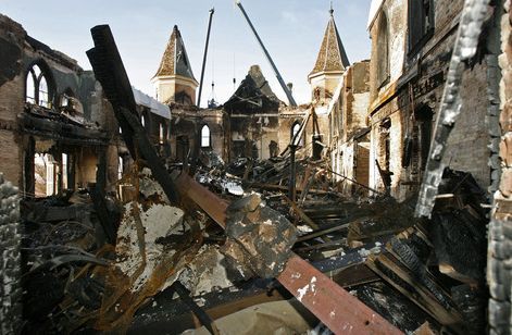 Francisco Kjolseth  |  The Salt Lake Tribune

Only a shell remains as crews begin to remove debris Tuesday from the historic Provo Tabernacle following last week's fire that gutted the beloved building.