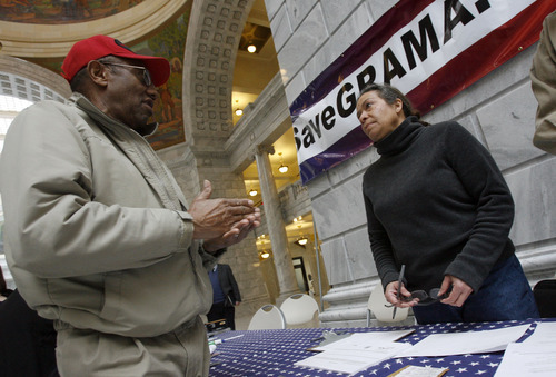 FRANCISCO KJOLSETH  |  The Salt Lake Tribune
Jim Newsome, of Clinton, talks with Collette Gillian, of Salt Lake City, at a rally Thursday to collect signatures to repeal HB477, which limits public access to government records.