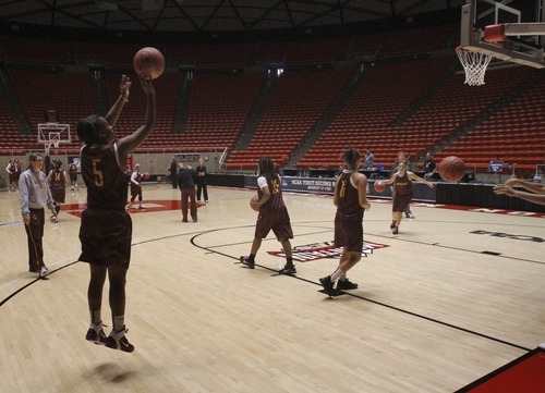 Rick Egan   |  The Salt Lake Tribune

Arizona State Guard, Deja Mann (5) takes a shot during the Sun Devils practice, at the Jon M. Huntsman Center in Salt Lake City, Friday, March 18, 2011